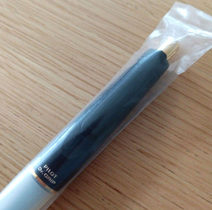 Pilot Dr. Grip fine tip black ballpoint pen with gold plating and black barrel, discontinued model