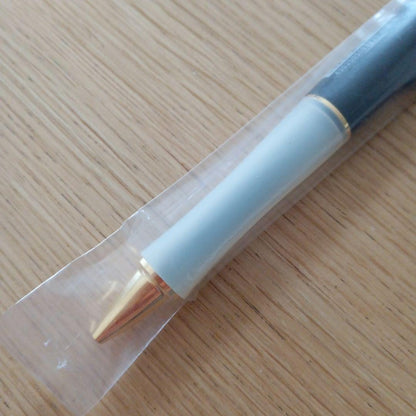 Pilot Dr. Grip fine tip black ballpoint pen with gold plating and black barrel, discontinued model