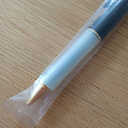 Pilot Dr. Grip fine tip black ballpoint pen with gold plating and black barrel, discontinued model