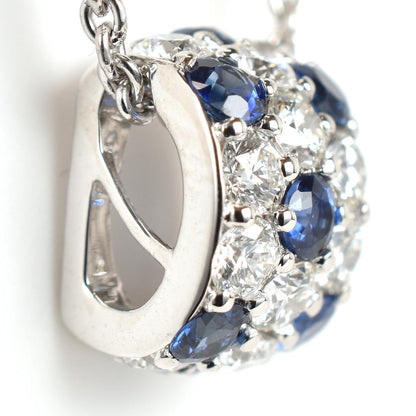Newly restored Mikimoto white gold necklace with sapphire and diamond pendant measuring 39 cm length