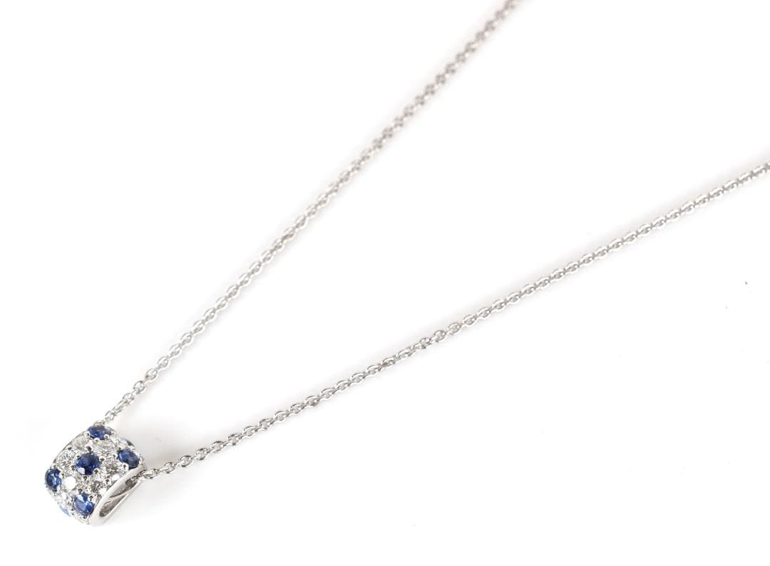 Newly restored Mikimoto white gold necklace with sapphire and diamond pendant measuring 39 cm length