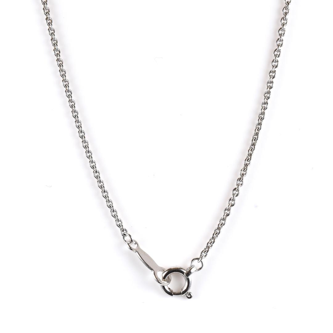 Newly restored Mikimoto white gold necklace with sapphire and diamond pendant measuring 39 cm length