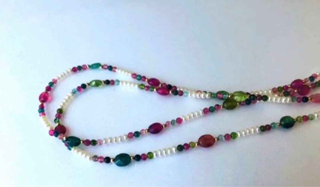 K18 2-strand gold necklace featuring 52 Akoya baby pearls and tourmaline details