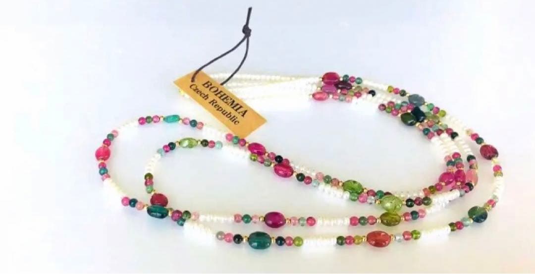 K18 2-strand gold necklace featuring 52 Akoya baby pearls and tourmaline details