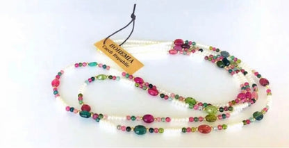 K18 2-strand gold necklace featuring 52 Akoya baby pearls and tourmaline details