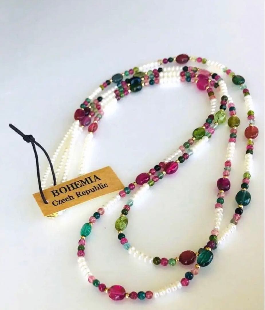 K18 2-strand gold necklace featuring 52 Akoya baby pearls and tourmaline details
