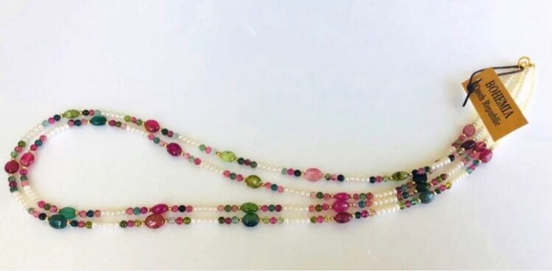K18 2-strand gold necklace featuring 52 Akoya baby pearls and tourmaline details