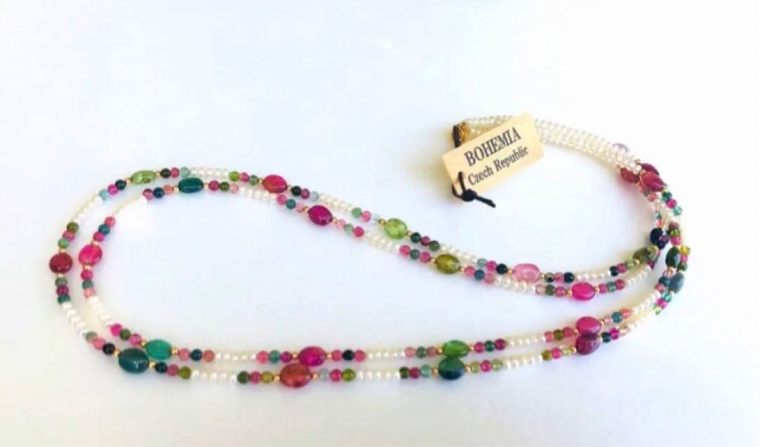 K18 2-strand gold necklace featuring 52 Akoya baby pearls and tourmaline details