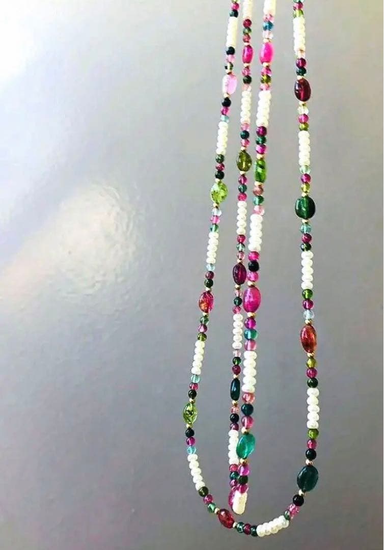 K18 2-strand gold necklace featuring 52 Akoya baby pearls and tourmaline details