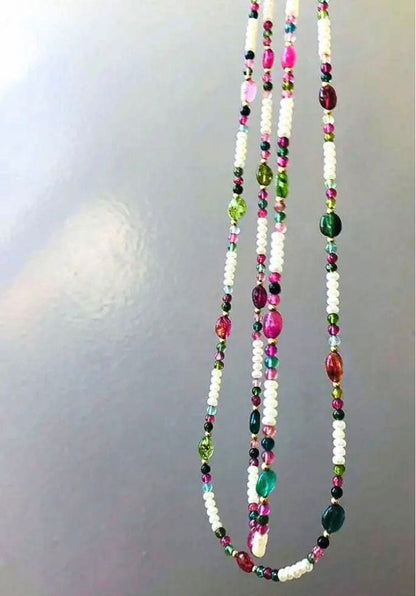 K18 2-strand gold necklace featuring 52 Akoya baby pearls and tourmaline details