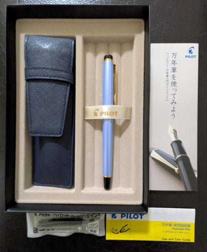 Pilot fountain pen model GRC-12FR-PLM in water blue with gold accents and matching pen case