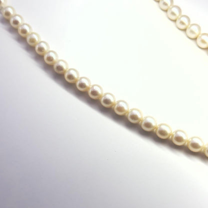 Tasaki silver necklace featuring pearls sized 6.9-7.3mm with a 43cm length