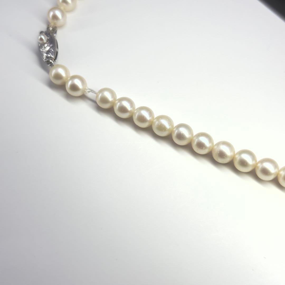 Tasaki silver necklace featuring pearls sized 6.9-7.3mm with a 43cm length