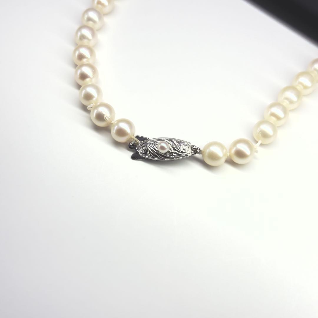 Tasaki silver necklace featuring pearls sized 6.9-7.3mm with a 43cm length
