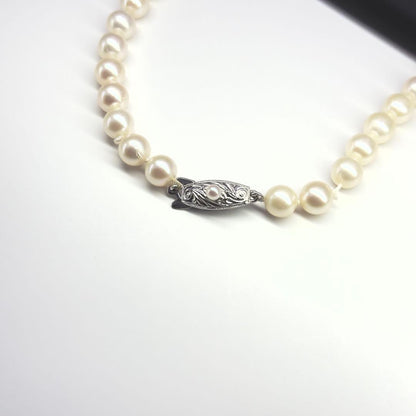 Tasaki silver necklace featuring pearls sized 6.9-7.3mm with a 43cm length