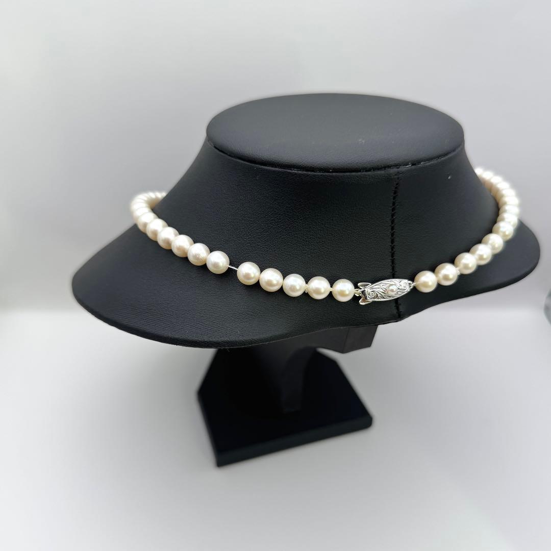 Tasaki silver necklace featuring pearls sized 6.9-7.3mm with a 43cm length