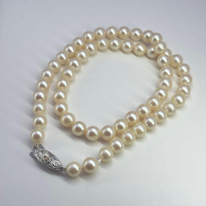 Tasaki silver necklace featuring pearls sized 6.9-7.3mm with a 43cm length