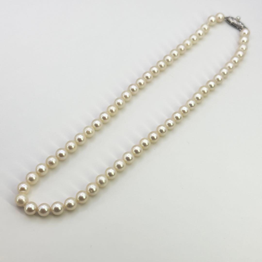 Tasaki silver necklace featuring pearls sized 6.9-7.3mm with a 43cm length