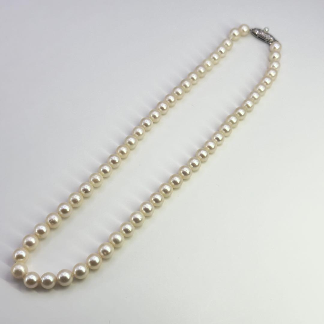 Tasaki silver necklace featuring pearls sized 6.9-7.3mm with a 43cm length
