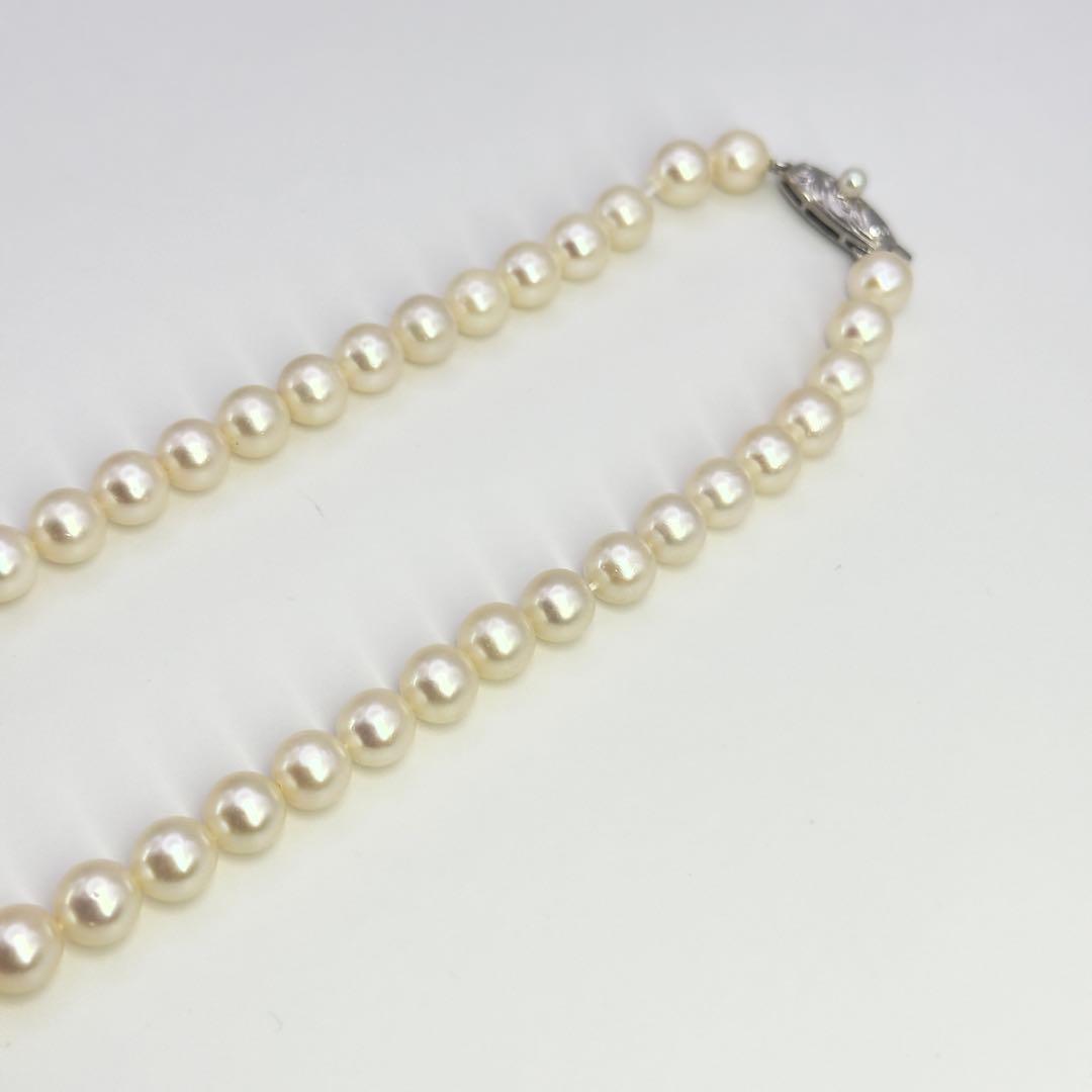 Tasaki silver necklace featuring pearls sized 6.9-7.3mm with a 43cm length