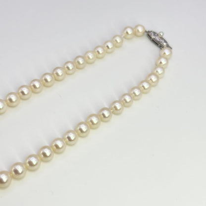 Tasaki silver necklace featuring pearls sized 6.9-7.3mm with a 43cm length