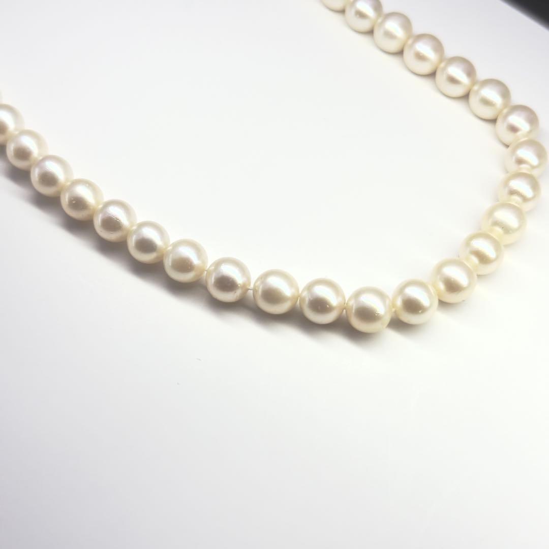 Tasaki silver necklace featuring pearls sized 6.9-7.3mm with a 43cm length