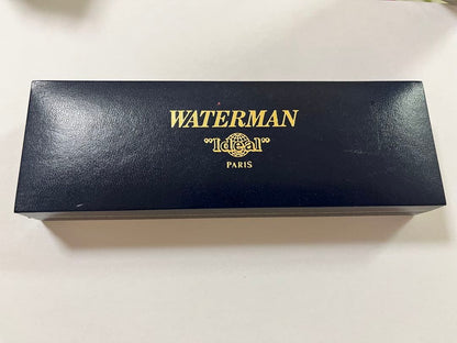 Vintage Waterman fountain pen shown with its protective case on a white background