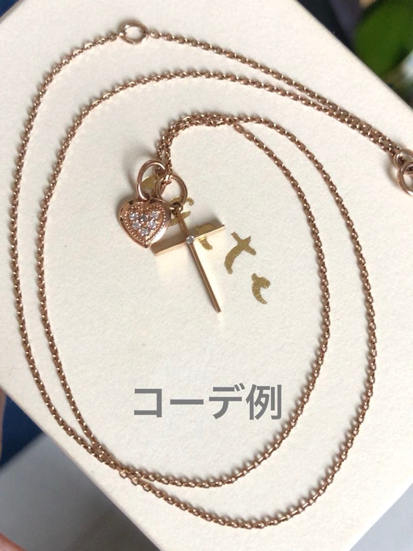 Agete K10 cross pendant top made of yellow gold weighing 0.59g with K10 agete 0.01 engraving