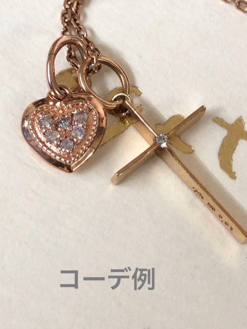 Agete K10 cross pendant top made of yellow gold weighing 0.59g with K10 agete 0.01 engraving