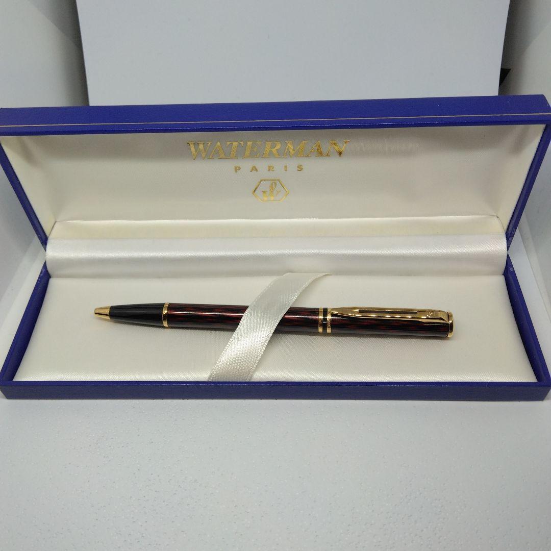 Waterman ballpoint pen in red and gold with sleek design and smooth writing tip