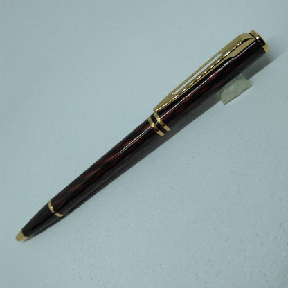 Waterman ballpoint pen in red and gold with sleek design and smooth writing tip