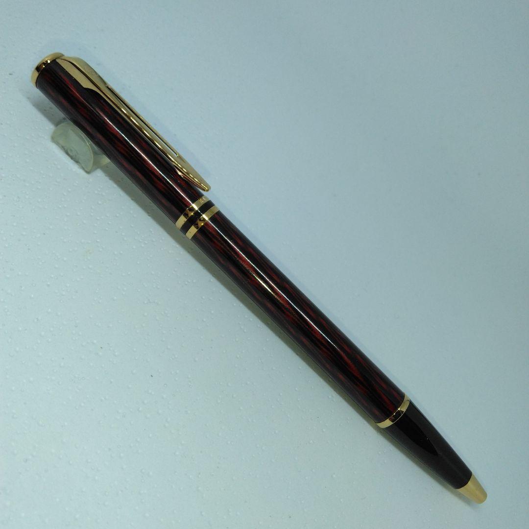 Waterman ballpoint pen in red and gold with sleek design and smooth writing tip