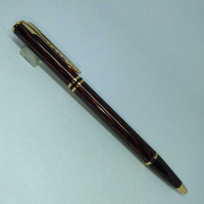 Waterman ballpoint pen in red and gold with sleek design and smooth writing tip
