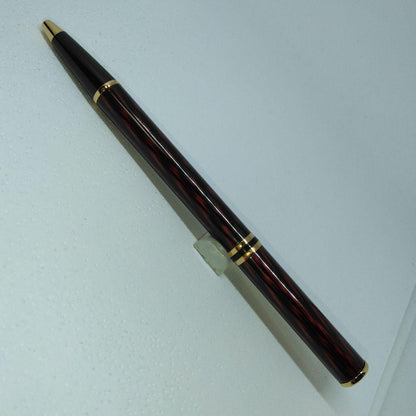 Waterman ballpoint pen in red and gold with sleek design and smooth writing tip