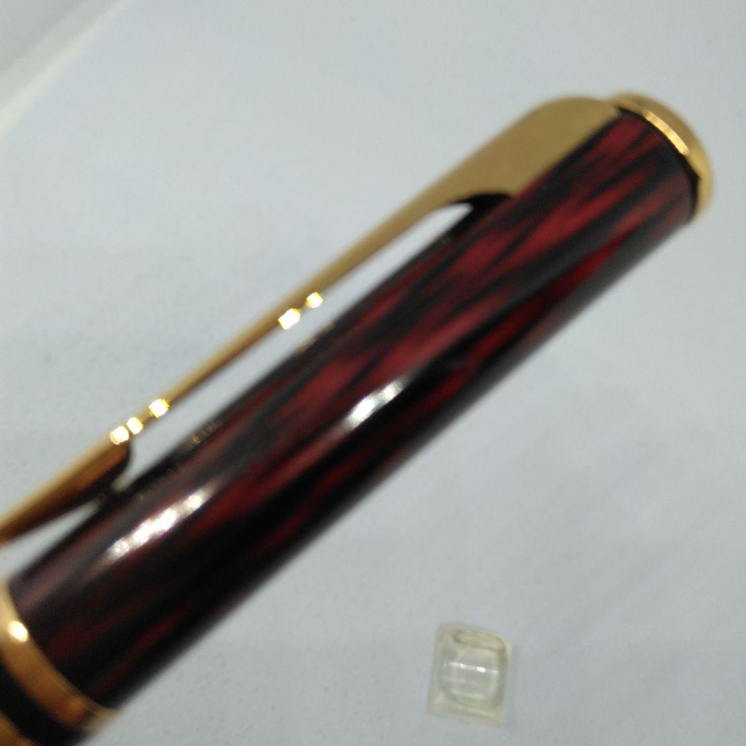 Waterman ballpoint pen in red and gold with sleek design and smooth writing tip