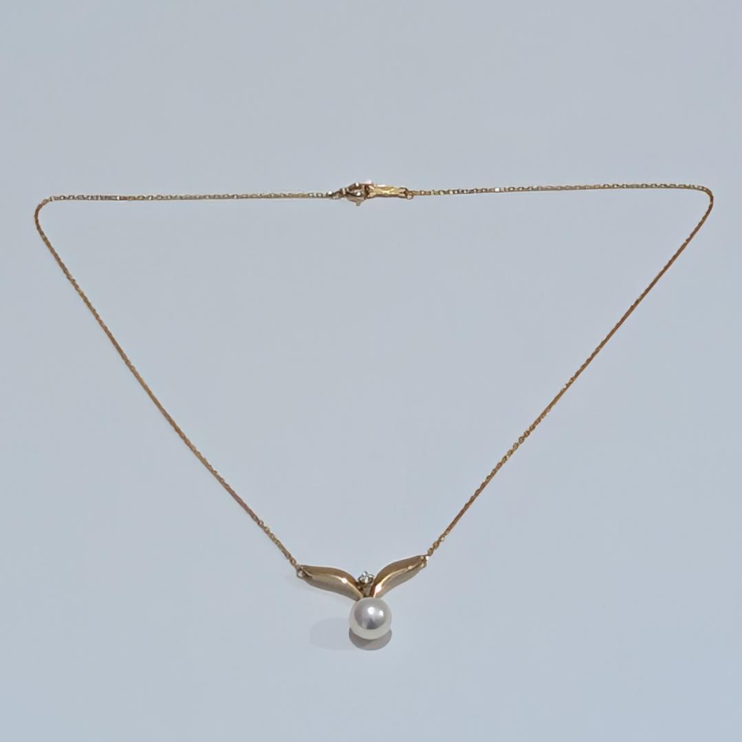 Mikimoto pearl diamond necklace with 7mm pearl set in 18K yellow gold on a 40cm chain