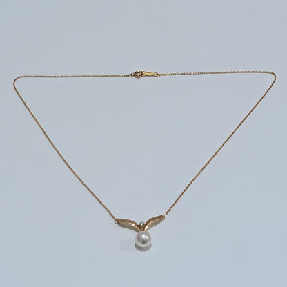 Mikimoto pearl diamond necklace with 7mm pearl set in 18K yellow gold on a 40cm chain