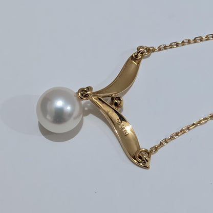 Mikimoto pearl diamond necklace with 7mm pearl set in 18K yellow gold on a 40cm chain