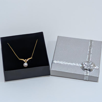 Mikimoto pearl diamond necklace with 7mm pearl set in 18K yellow gold on a 40cm chain