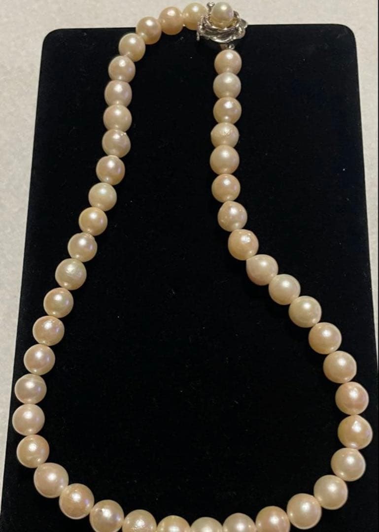 Akoya Pearl Necklace with one 9mm round pearl in slight champagne gold on silver chain with double lock