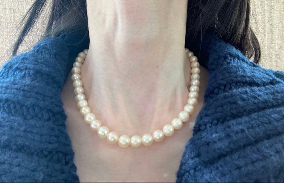 Akoya Pearl Necklace with one 9mm round pearl in slight champagne gold on silver chain with double lock