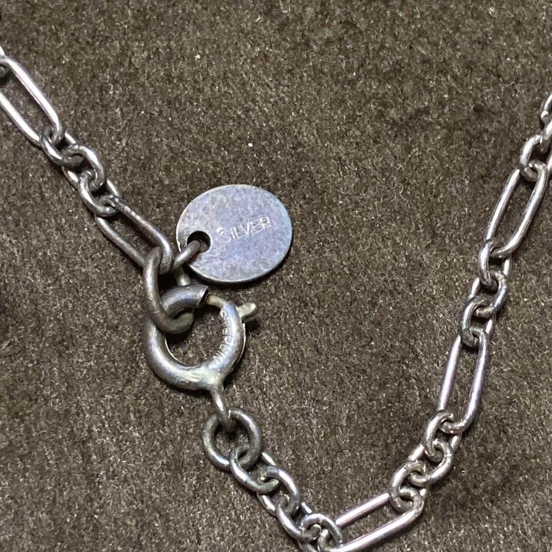 Agete necklace with large freshwater pearls, transparent aquamarine stones, and a 45cm silver chain partially blackened