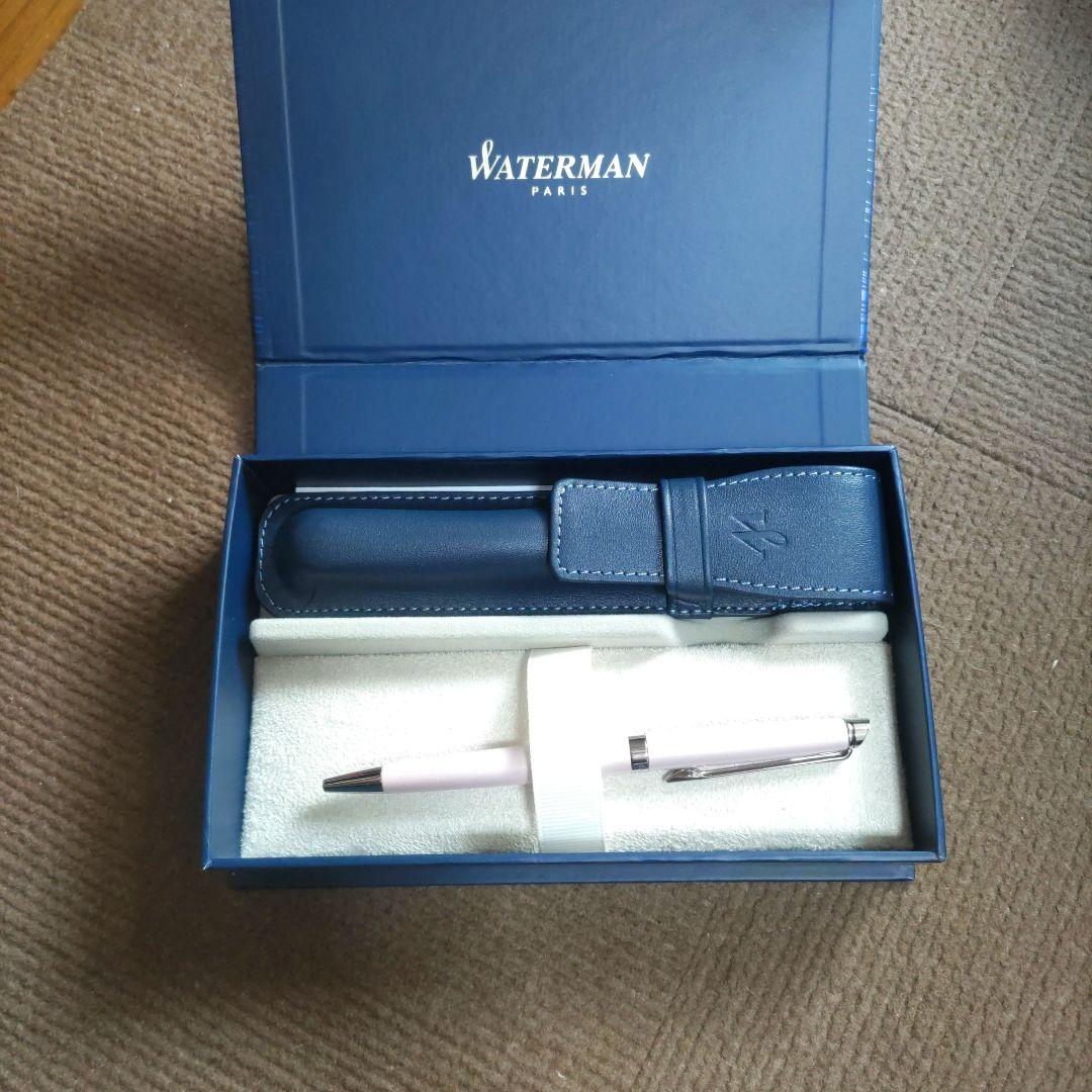 WATERMAN ballpoint pen with light pink body and silver trim, displayed with matching pen case