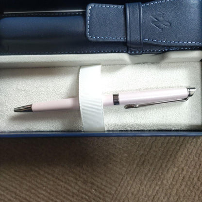WATERMAN ballpoint pen with light pink body and silver trim, displayed with matching pen case