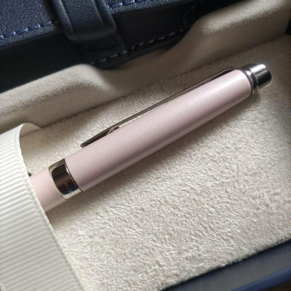 WATERMAN ballpoint pen with light pink body and silver trim, displayed with matching pen case