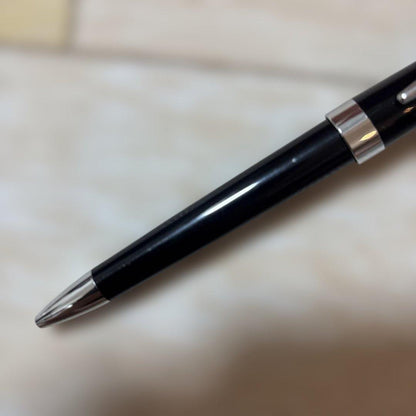 CROSS ballpoint pen with glossy black body and silver accents shown on white background