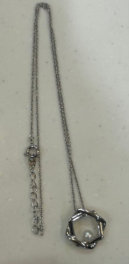 Tasaki baby pearl necklace with silver SV925 chain and pearl pendant displayed with a box