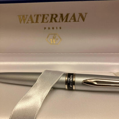 Waterman ballpoint pen with twist mechanism and included case displayed on white background