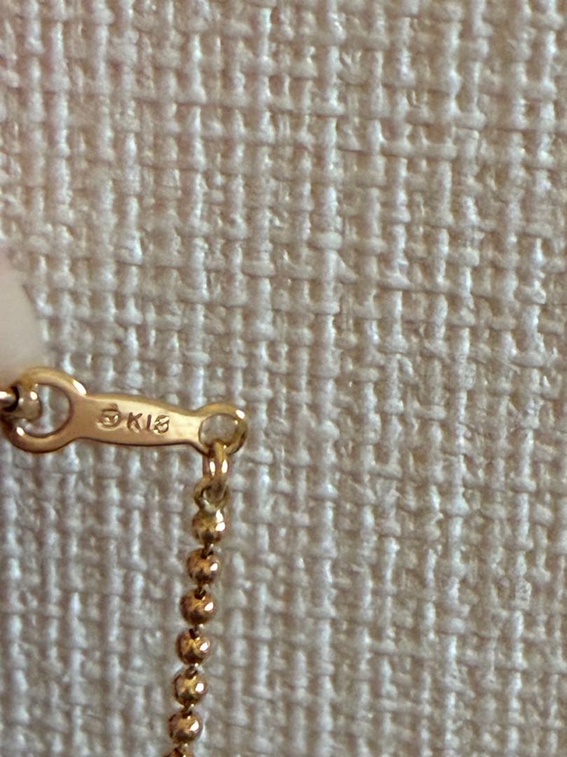Mikimoto single pearl necklace featuring a 7.5mm cream tone pearl on a 38cm K18 yellow gold ball chain