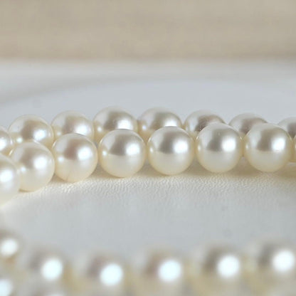 Highest grade Hanadama Mikimoto Akoya pearl necklace with 6.5mm round pearls and silver chain length 37cm